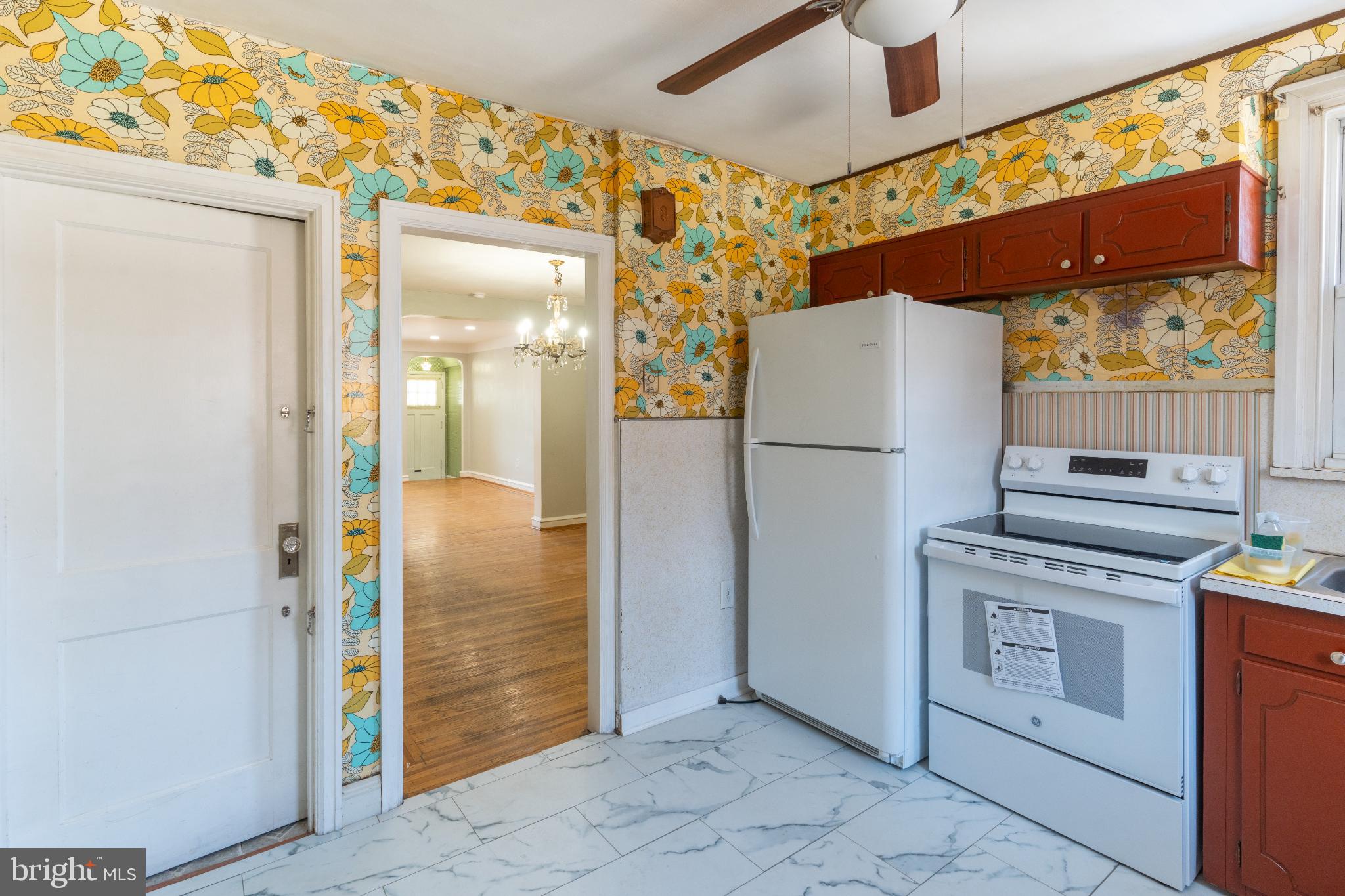 6755 Rutland Street Philadelphia, PA 19149 - Photo 8 of 21 Charming kitchen with vintage floral wallpaper.
