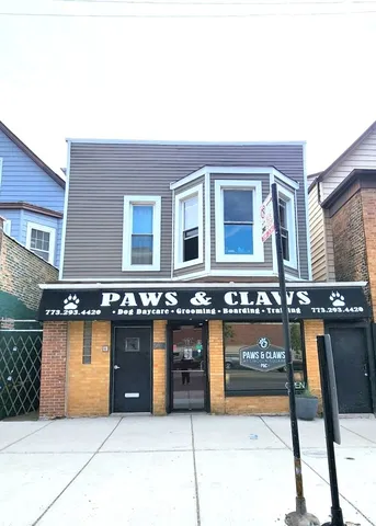 a front view of a house with yard