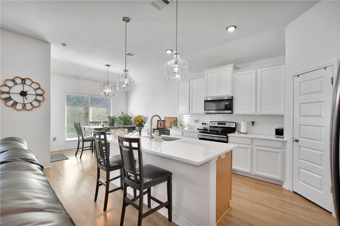 1908 Meridian Court Bryan, TX 77807 - Photo 18 of 46 Breakfast Island is great for extra seating when entertaining