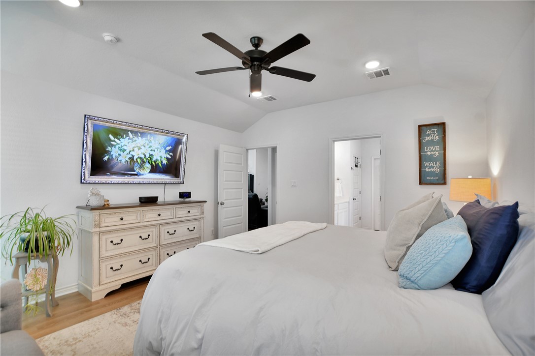 1908 Meridian Court Bryan, TX 77807 - Photo 24 of 46 Master bedroom with tall ceilings and recessed lighting