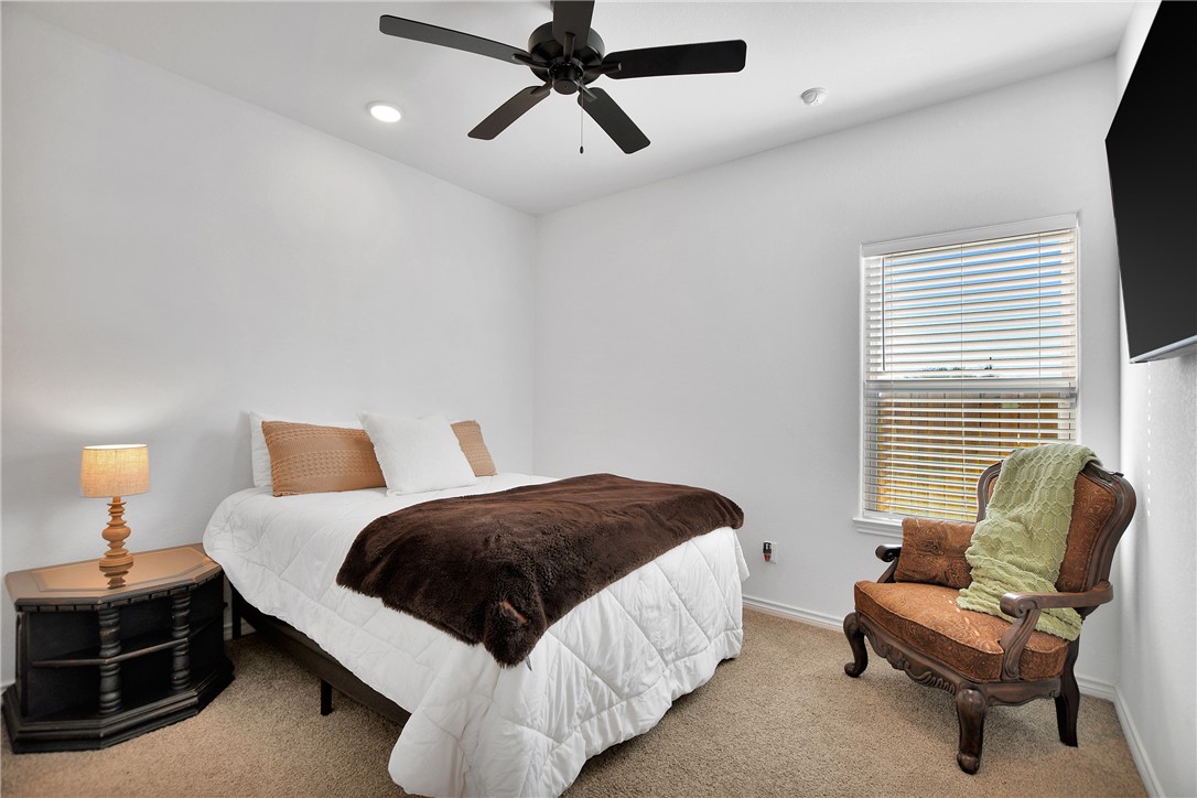1908 Meridian Court Bryan, TX 77807 - Photo 30 of 46 3rd Bedroom is spacious and large enough for a kind=g size bed