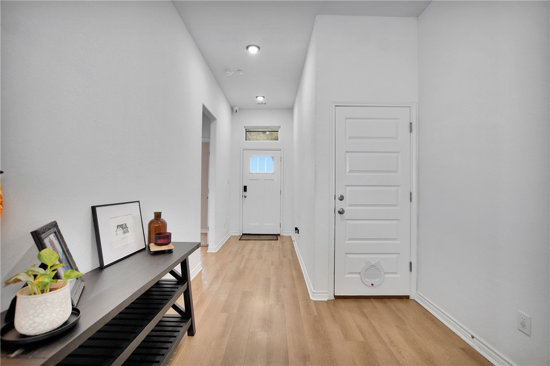 1908 Meridian Court Bryan, TX 77807 - Photo 3 of 46 Nice wide entry welcomes you in to this warm and inviting home