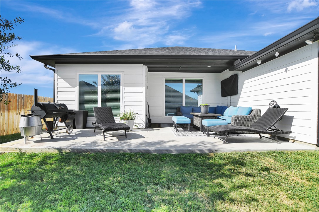 1908 Meridian Court Bryan, TX 77807 - Photo 33 of 46 The back deck has added space and a space for a Out door TV, Wiring was added