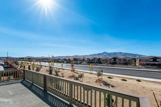a view of city from a balcony