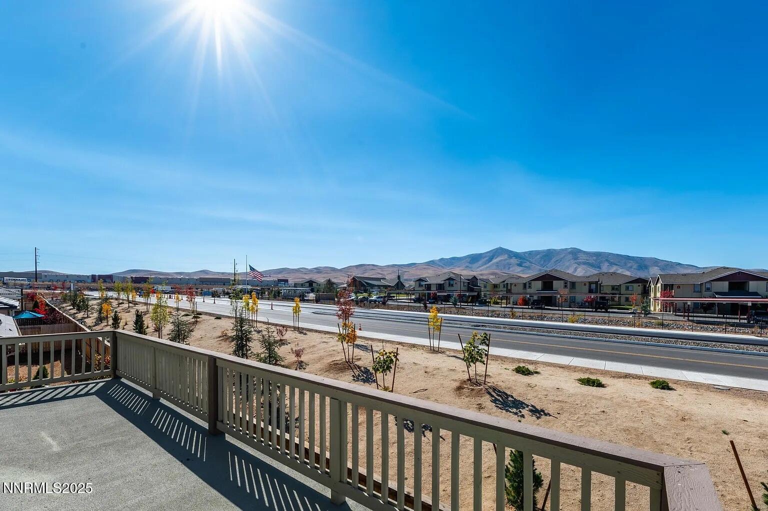 7731 Enclave Key Road Reno, NV 89506 - Photo 18 of 43 a view of city from a balcony