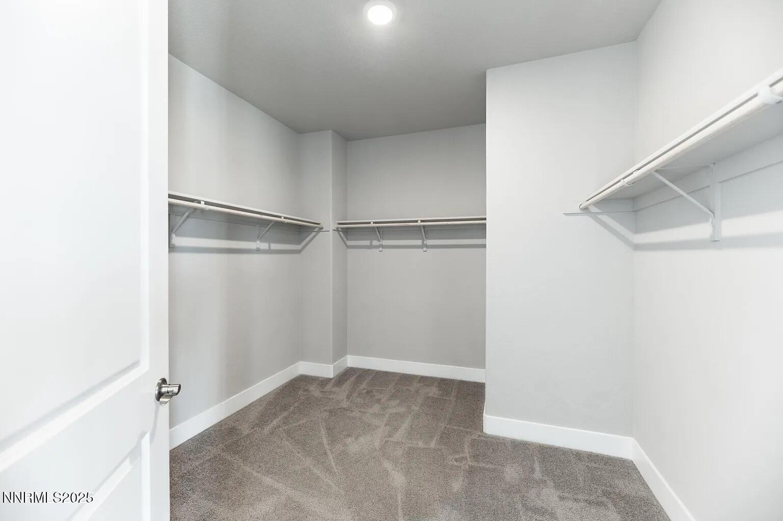 7731 Enclave Key Road Reno, NV 89506 - Photo 19 of 43 a view of an empty walk in closet