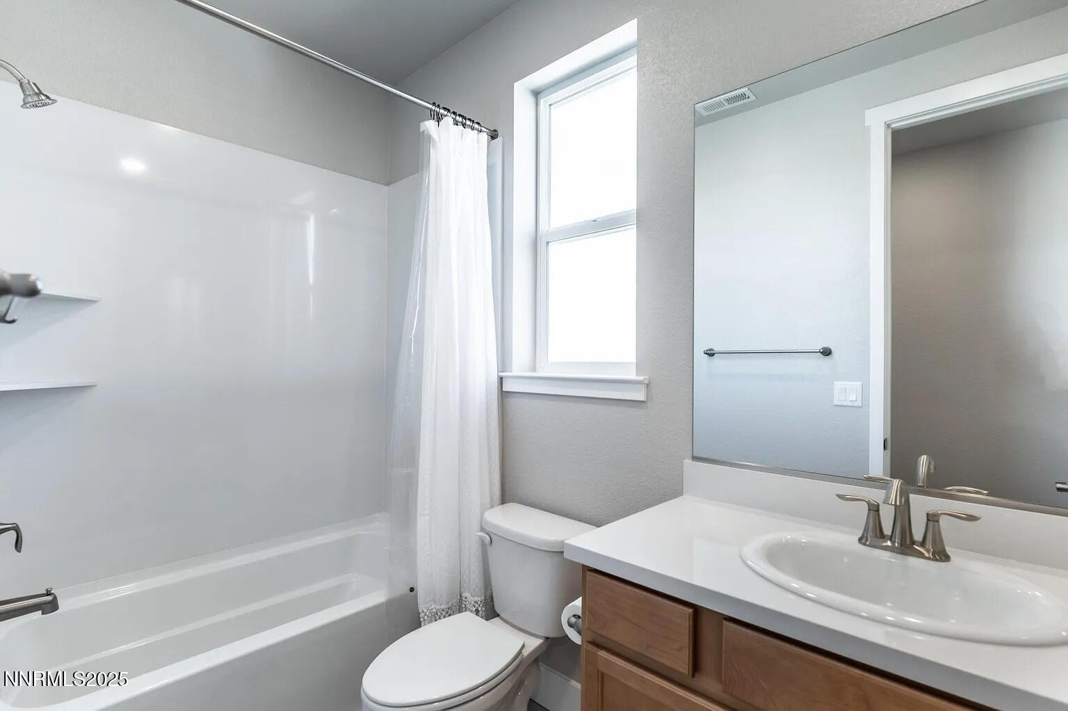7731 Enclave Key Road Reno, NV 89506 - Photo 26 of 43 a bathroom with a sink toilet and shower