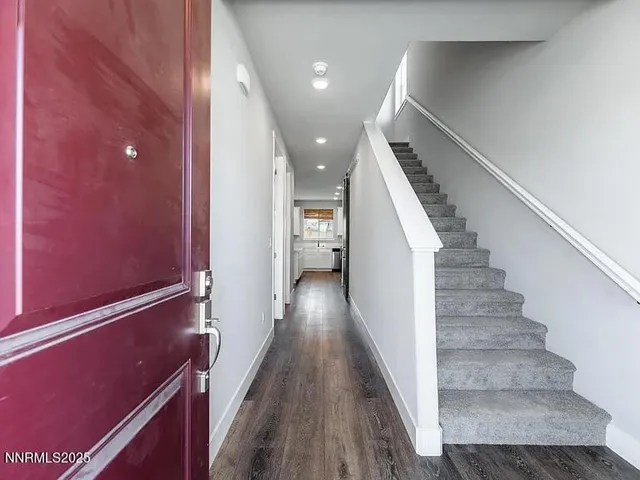 a view of hallway with stairs