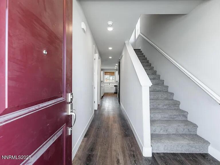 7731 Enclave Key Road Reno, NV 89506 - Photo 31 of 43 a view of hallway with stairs
