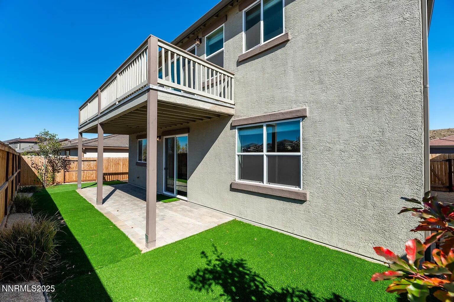 7731 Enclave Key Road Reno, NV 89506 - Photo 32 of 43 a view of a house with a yard