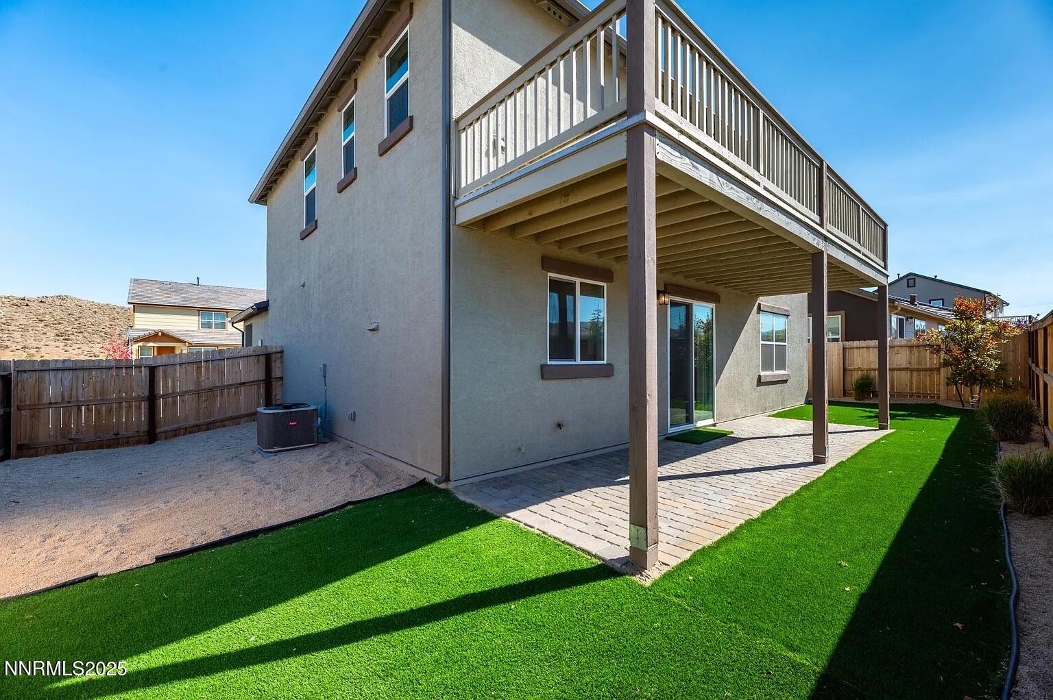 7731 Enclave Key Road Reno, NV 89506 - Photo 33 of 43 a view of a house with a yard