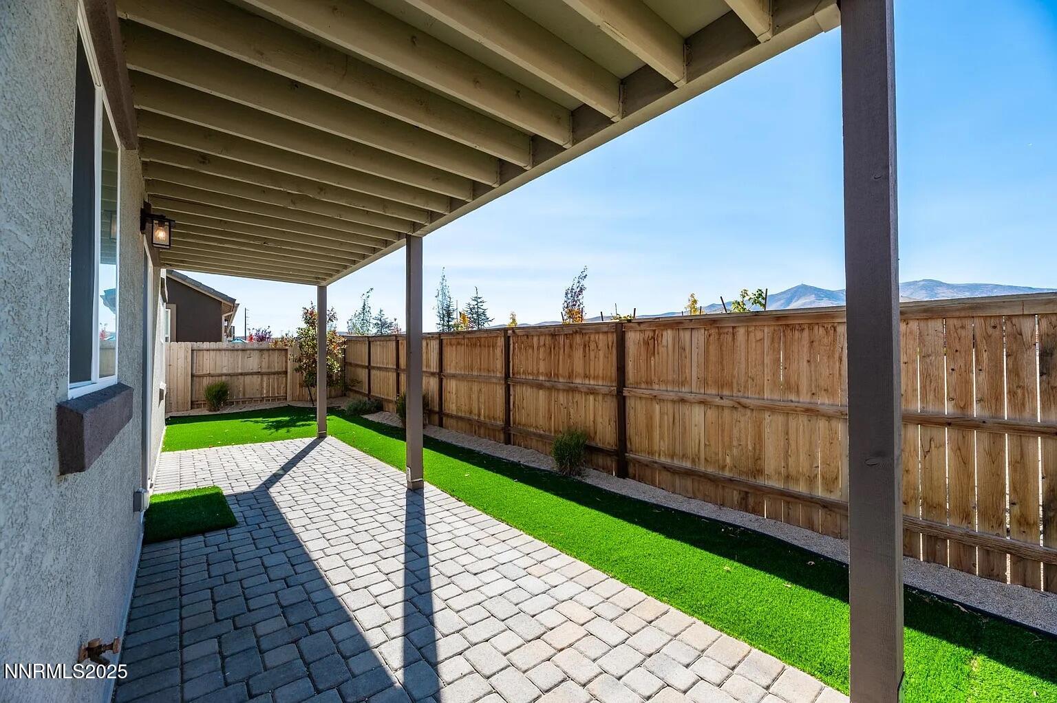 7731 Enclave Key Road Reno, NV 89506 - Photo 38 of 43 a view of small backyard with a small cabin