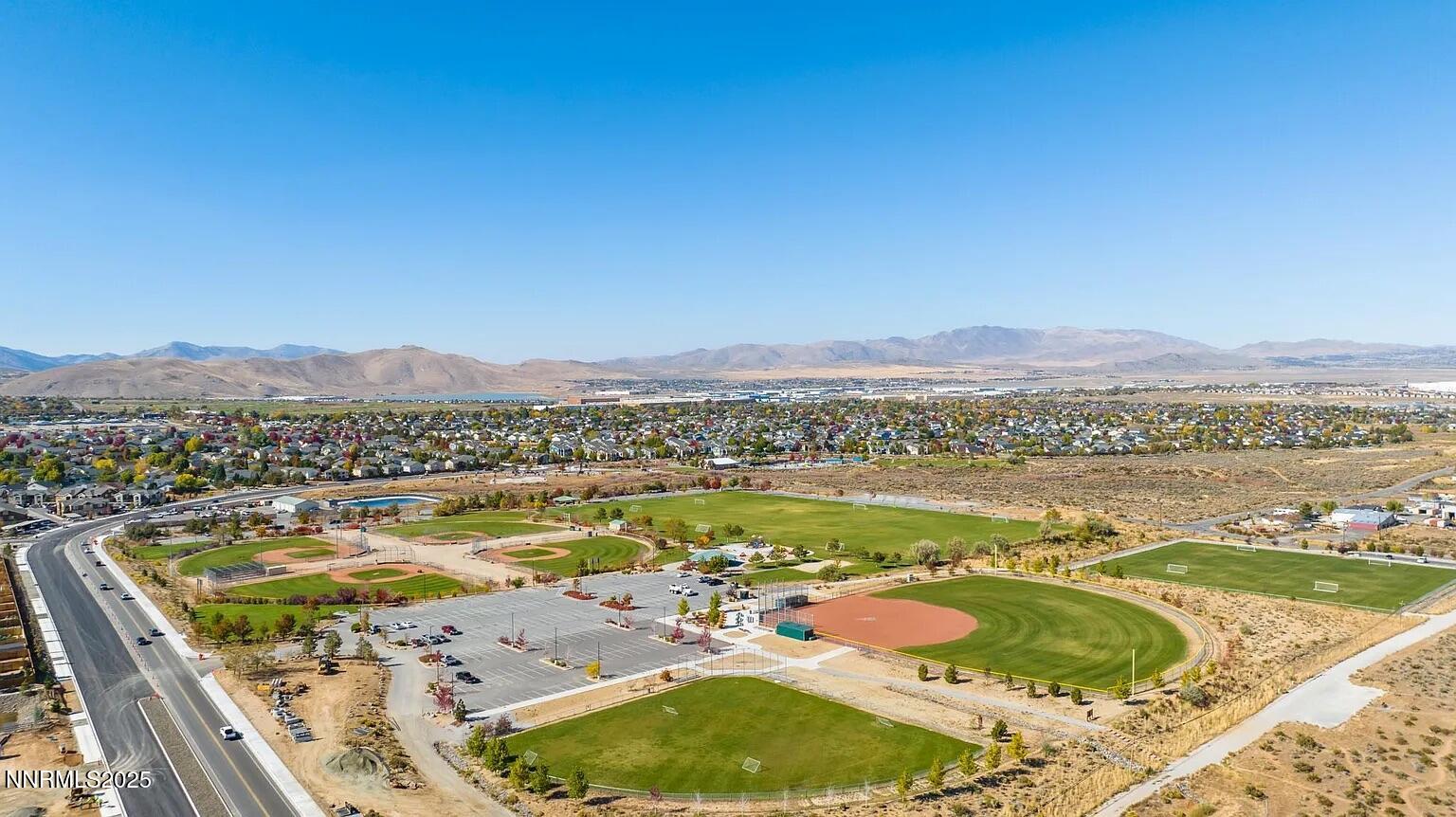 7731 Enclave Key Road Reno, NV 89506 - Photo 43 of 43 a view of a swimming pool with a balcony