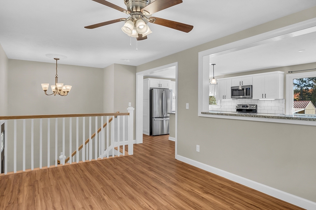 3 Reed Hill Road Wales, MA 01081 - Photo 17 of 23 a view of a livingroom with furniture wooden floor and chandelier