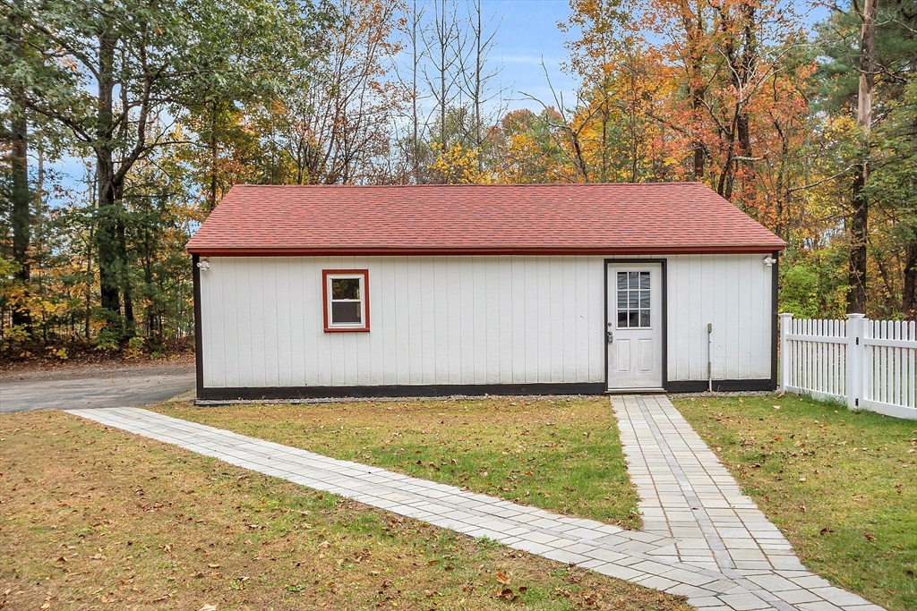 3 Reed Hill Road Wales, MA 01081 - Photo 5 of 23 a house that has a tree in front of it