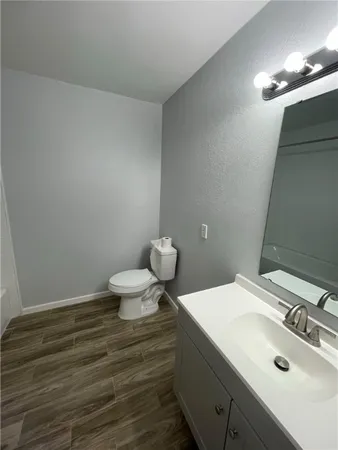 a bathroom with a sink and a toilet