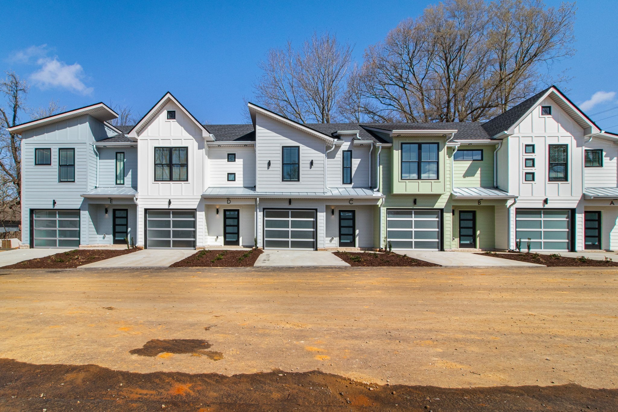 a view of a white house with a large windows