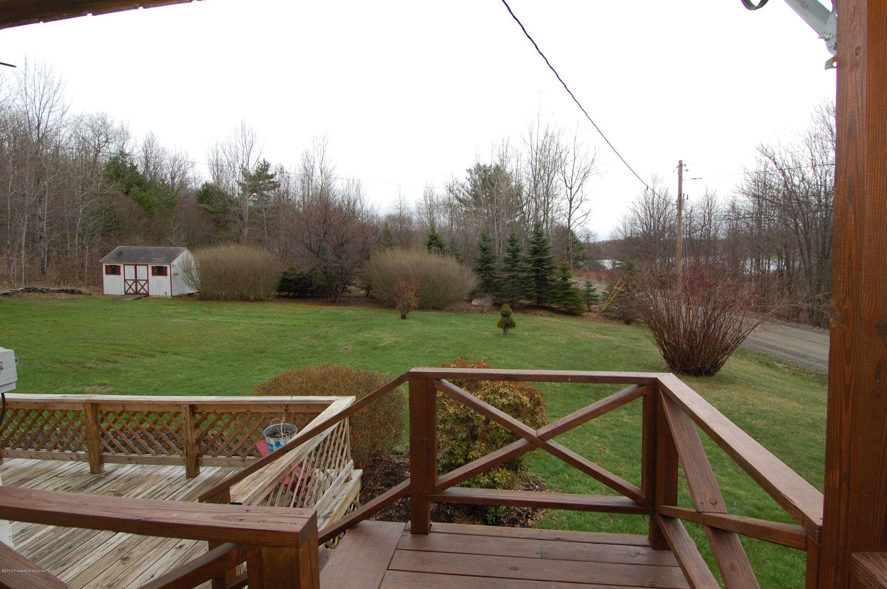1129 Corbin Road Kingsley, PA 18826 - Photo 4 of 24 a view of a wooden deck with yard
