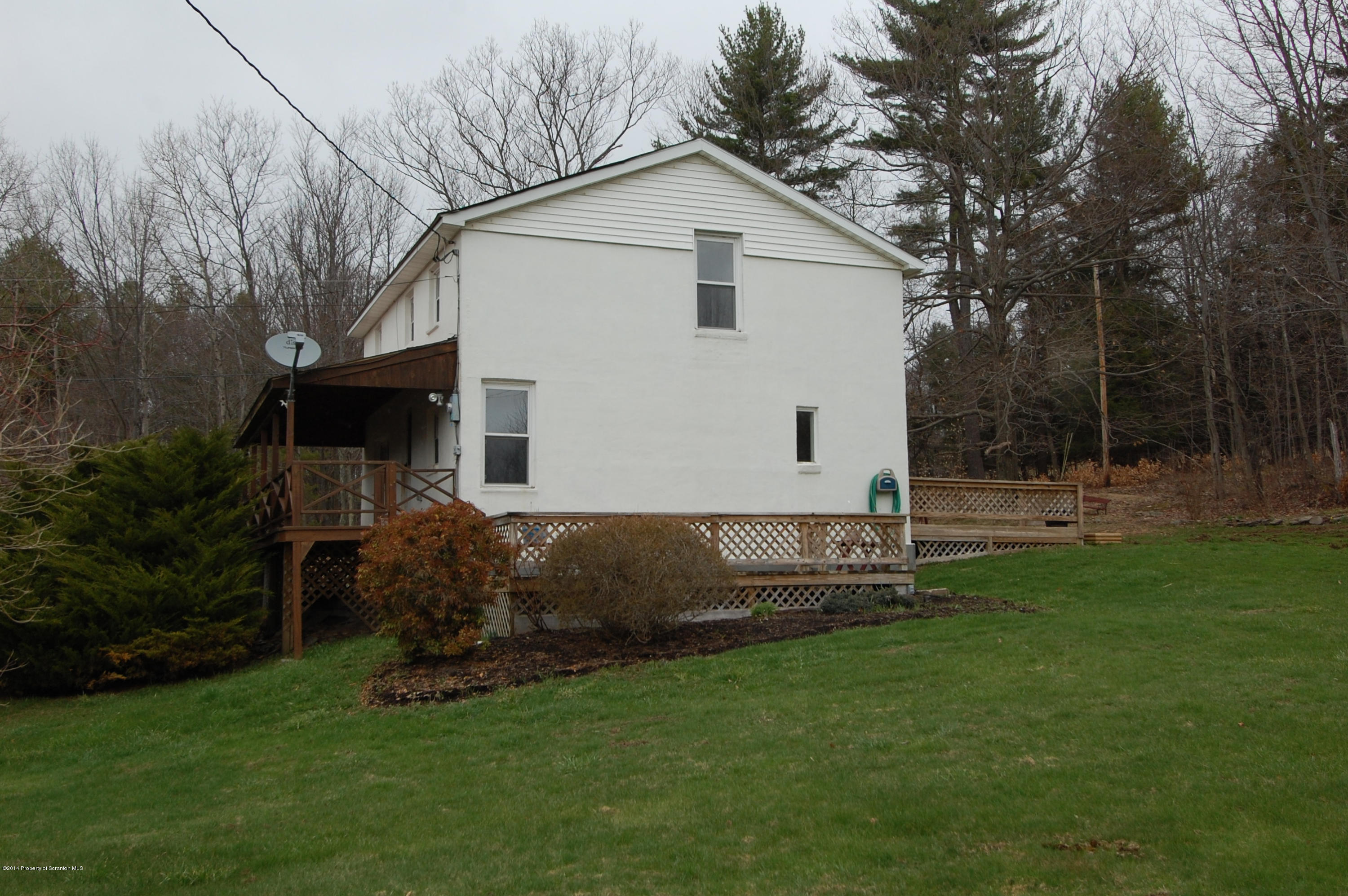 1129 Corbin Road Kingsley, PA 18826 - Photo 5 of 24 a view of backyard of house with green space
