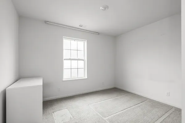 an empty room with a window