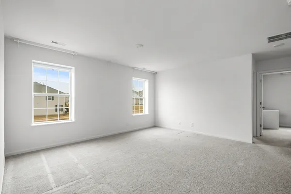an empty room with windows
