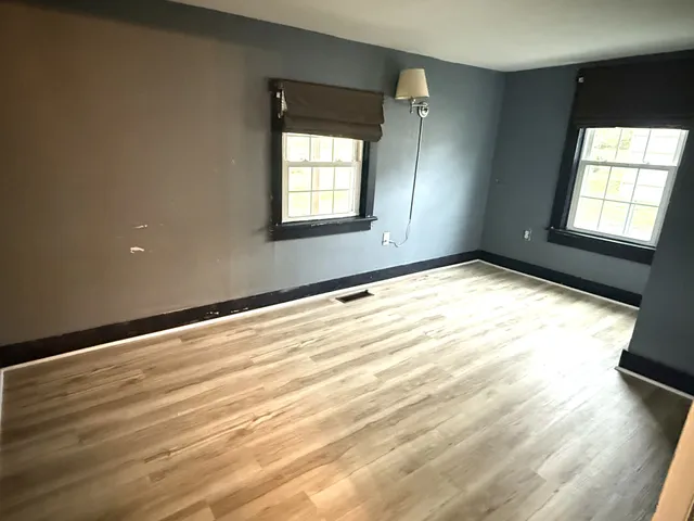 a view of an empty room and window