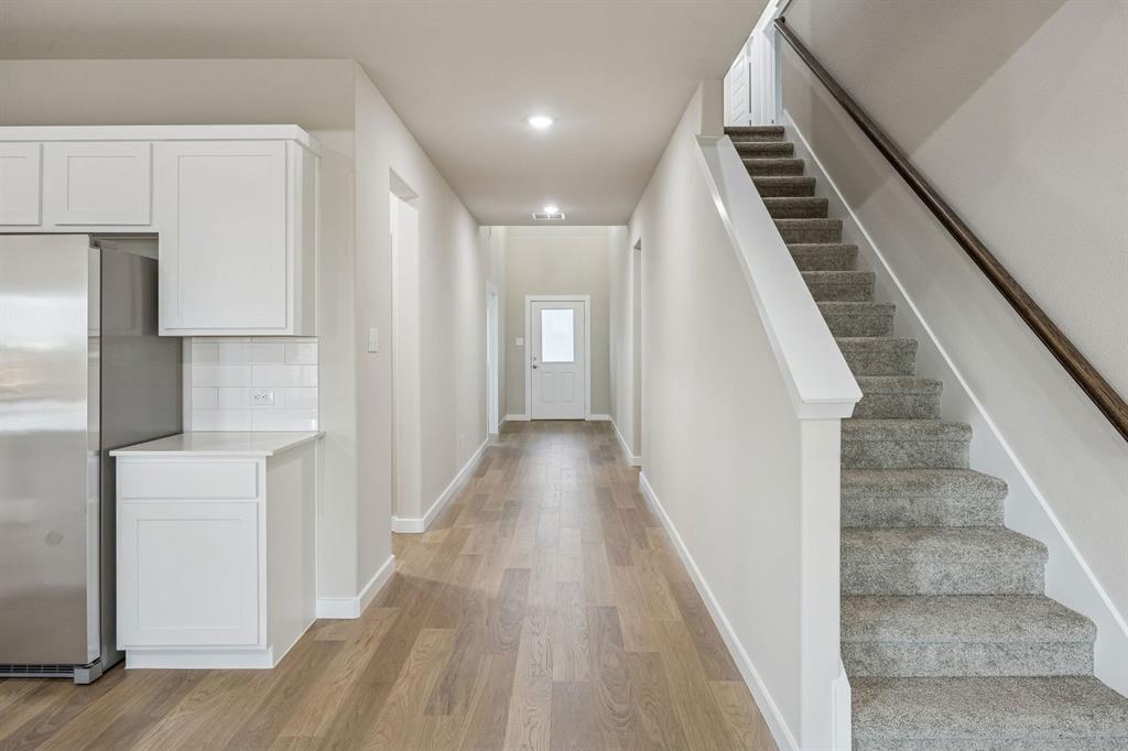 1113 Del Rio Drive Lavon, TX 75166 - Photo 37 of 40 Entryway in the Wimbledon home plan by Trophy Signature Homes – REPRESENTATIVE PHOTO