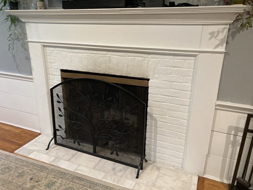 24 Baxter Street Worcester, MA 01602 - Photo 17 of 36 a close view of fireplace in room