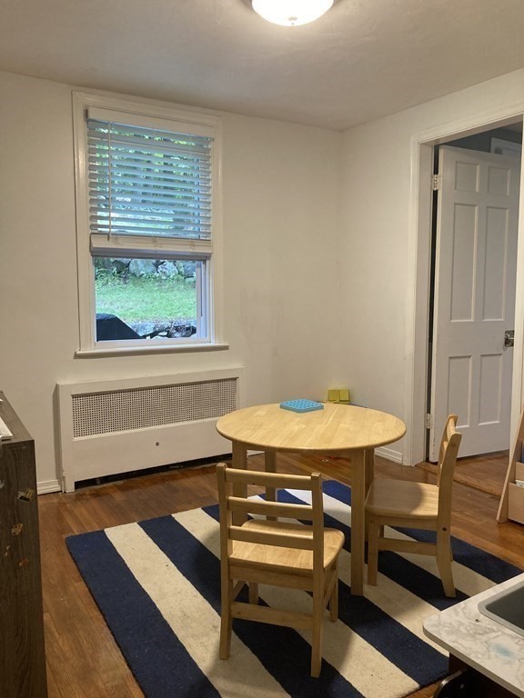 24 Baxter Street Worcester, MA 01602 - Photo 25 of 36 a room with chairs and a window
