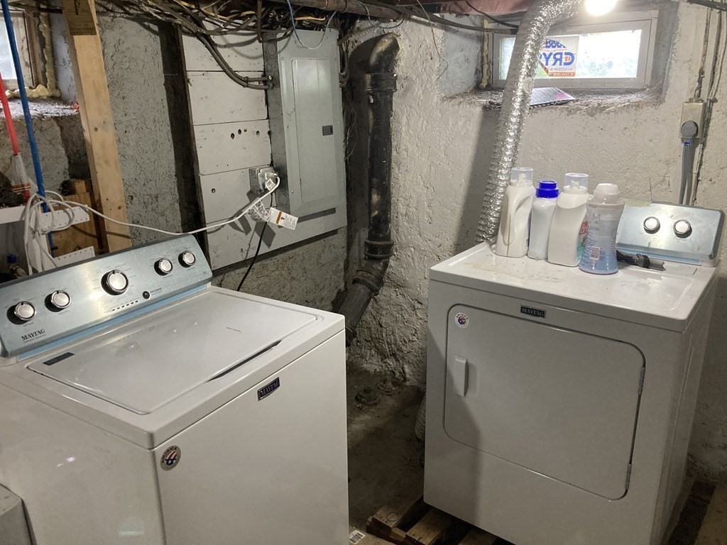 24 Baxter Street Worcester, MA 01602 - Photo 29 of 36 a utility room with dryer and washer