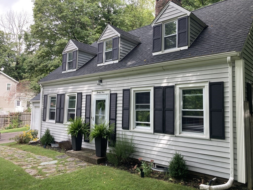 24 Baxter Street Worcester, MA 01602 - Photo 3 of 36 front view of a house with a yard