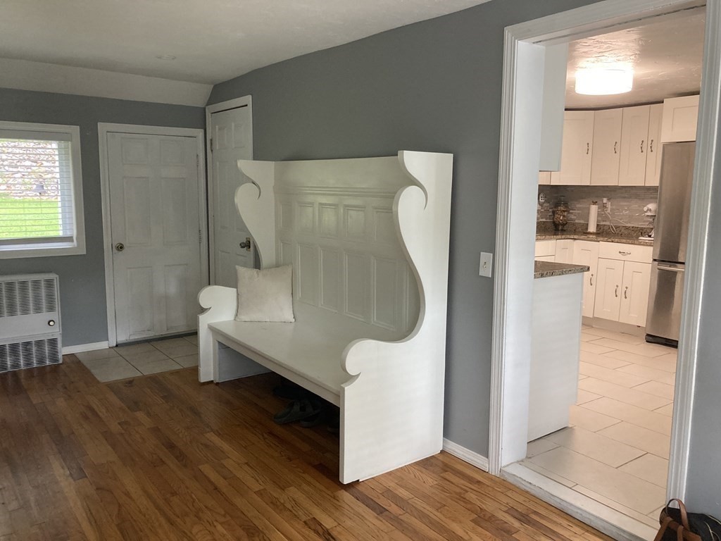 24 Baxter Street Worcester, MA 01602 - Photo 7 of 36 a bathroom with a bathtub and a walk in closet