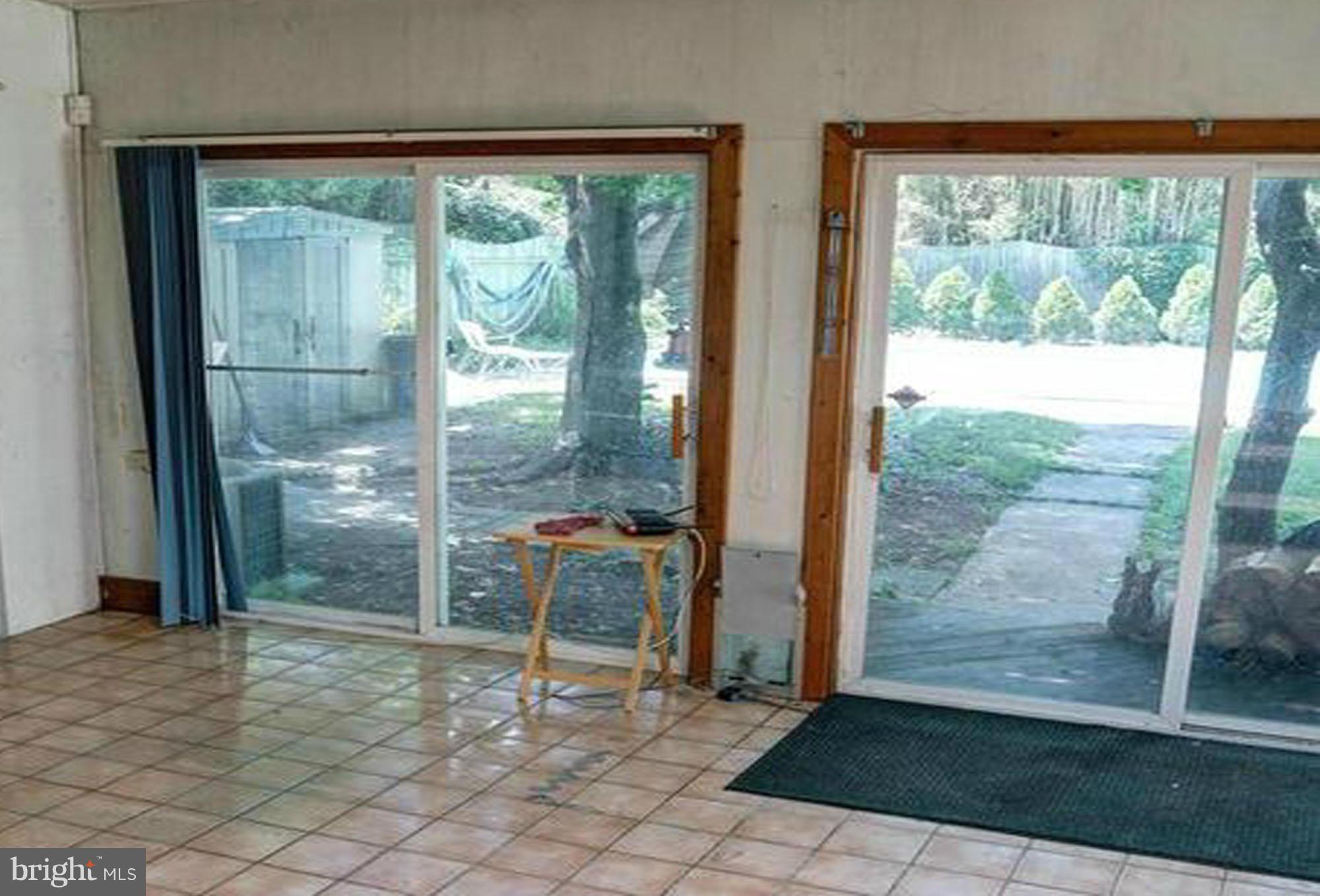 214 Chelsea Road Pasadena, MD 21122 - Photo 18 of 26 Family Room/Sun Room 22'x14'