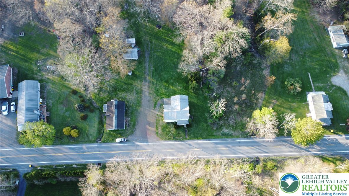 5444 Quakake Road Weatherly, PA 18255 - Photo 5 of 21 This expansive aerial view showcases a peaceful, rural property.