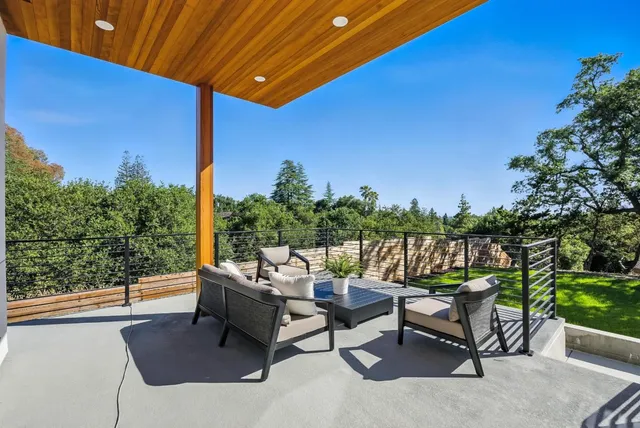a bathroom with a granite countertop sink mirror bathtub and shower