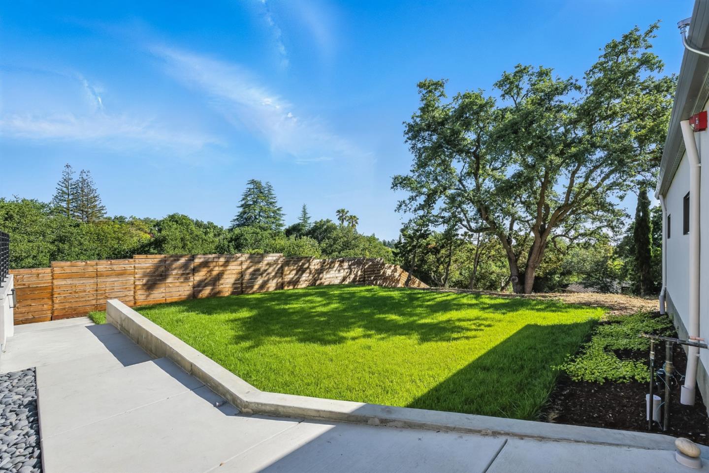 1127 Hillslope Place Los Altos, CA 94024 - Photo 22 of 70 a view of a backyard with plants