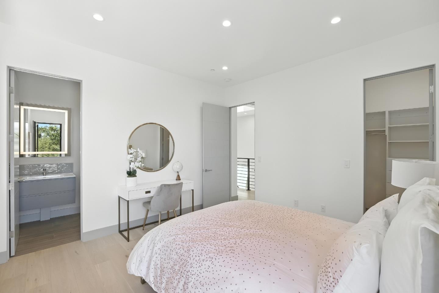 1127 Hillslope Place Los Altos, CA 94024 - Photo 38 of 70 a bedroom with a bed a desk and chair