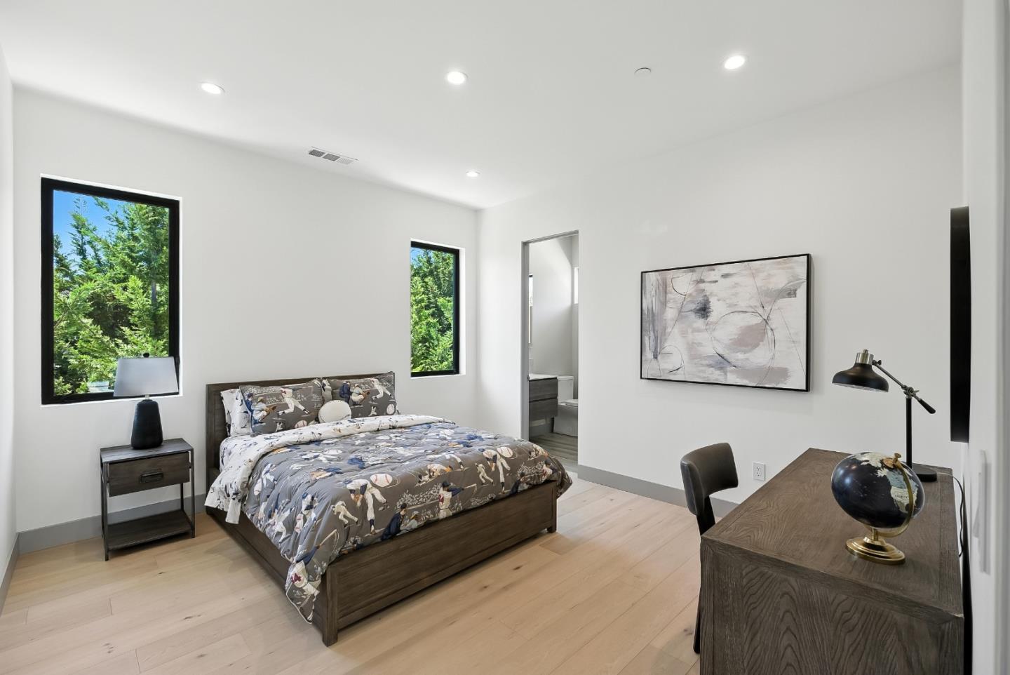 1127 Hillslope Place Los Altos, CA 94024 - Photo 39 of 70 a bedroom with a bed and wooden floor