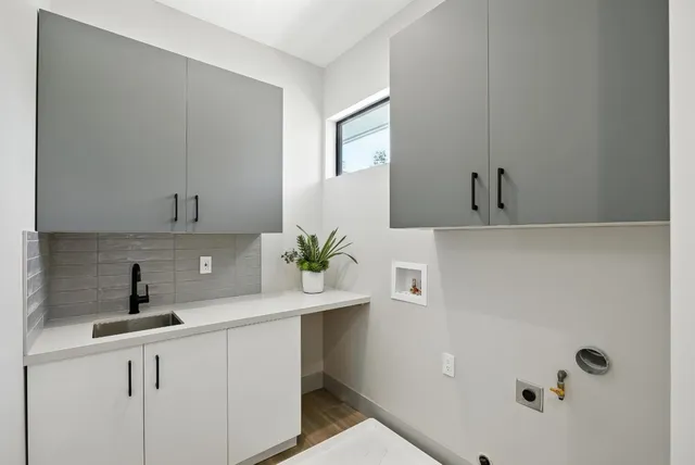 an aerial view of a house with a garden