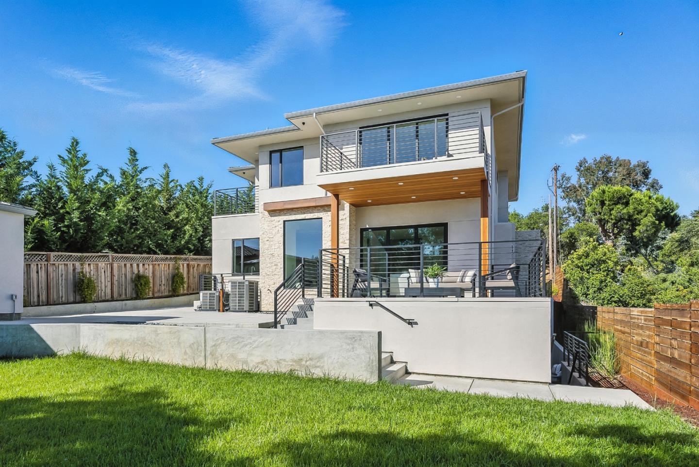 1127 Hillslope Place Los Altos, CA 94024 - Photo 60 of 70 a view of a house with swimming pool and a bench