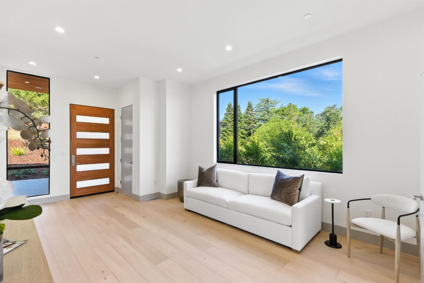 1127 Hillslope Place Los Altos, CA 94024 - Photo 6 of 70 a living room with furniture and a large window
