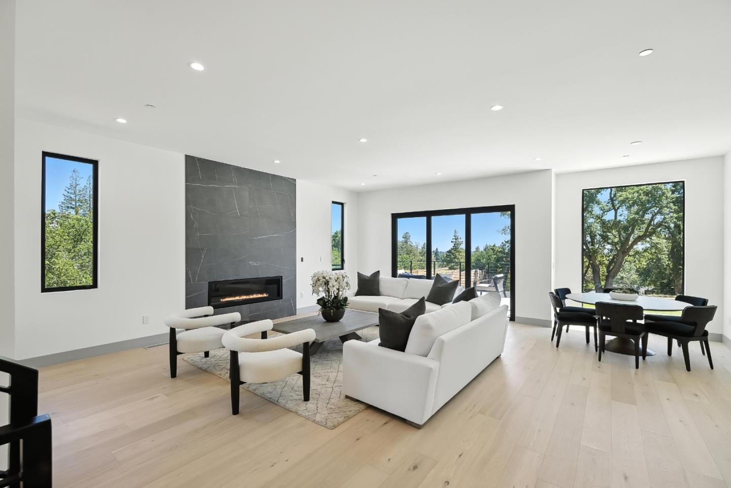1127 Hillslope Place Los Altos, CA 94024 - Photo 9 of 70 a living room with furniture and floor to ceiling windows