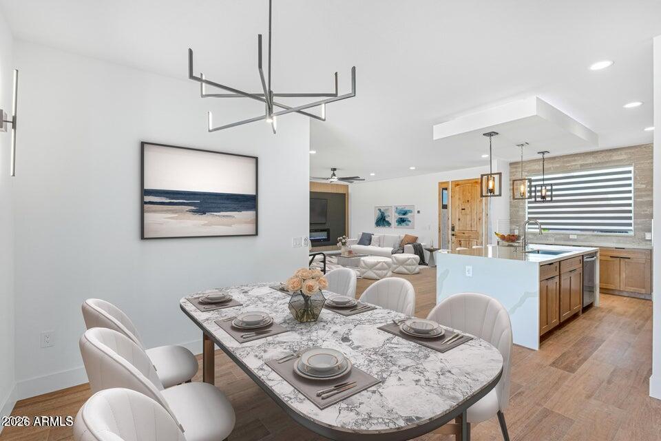 14833 South Brook Hollow Road Arizona City, AZ 85123 - Photo 14 of 61 a view of a dining room with furniture