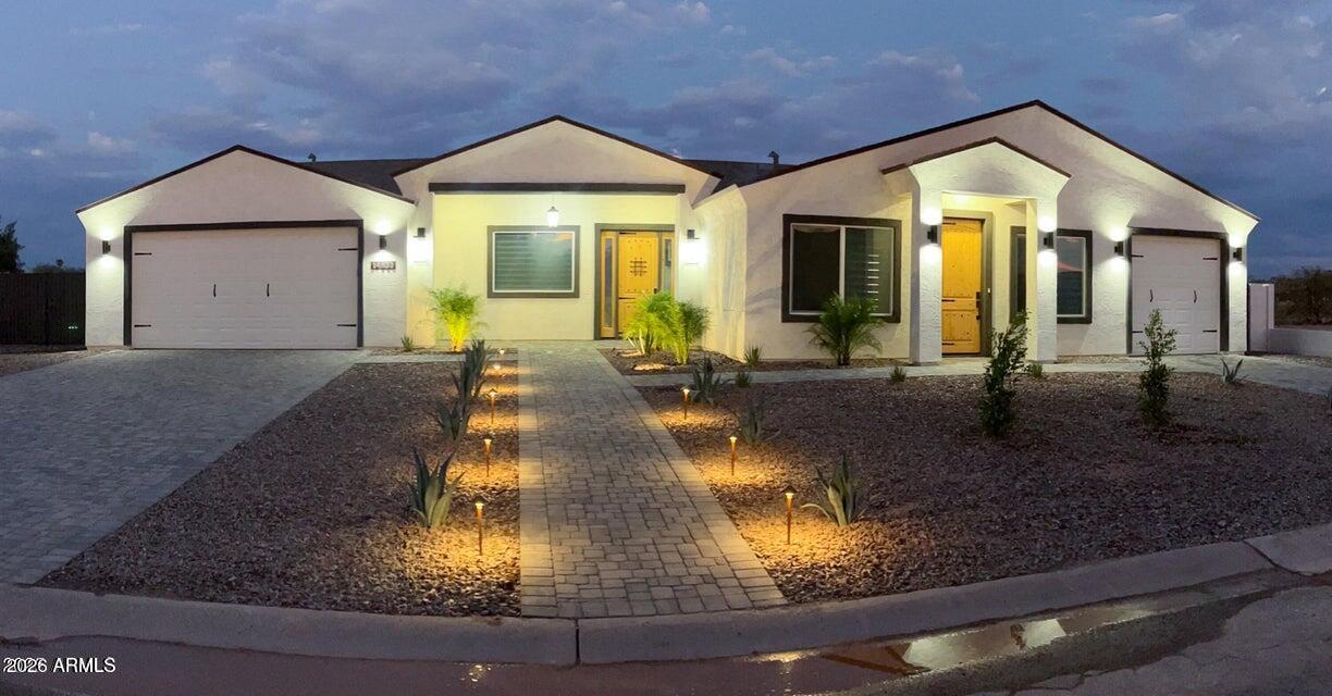 14833 South Brook Hollow Road Arizona City, AZ 85123 - Photo 2 of 61 a view of a house with large trees and outdoor space