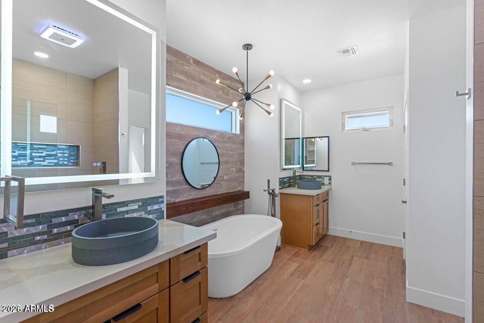 14833 South Brook Hollow Road Arizona City, AZ 85123 - Photo 25 of 61 a kitchen with a refrigerator and a sink
