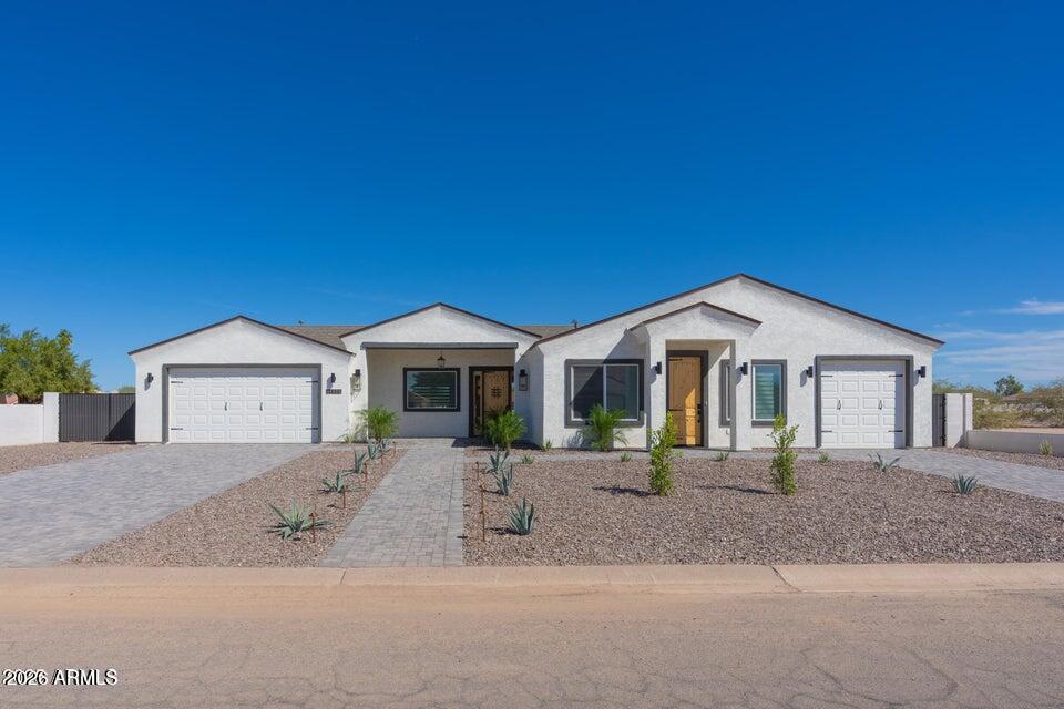 14833 South Brook Hollow Road Arizona City, AZ 85123 - Photo 3 of 61 a front view of a house with a yard