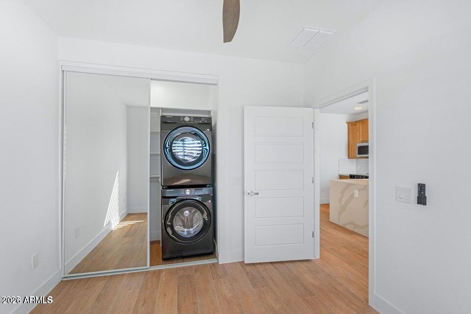 14833 South Brook Hollow Road Arizona City, AZ 85123 - Photo 44 of 61 a view of livingroom with washer and dryer