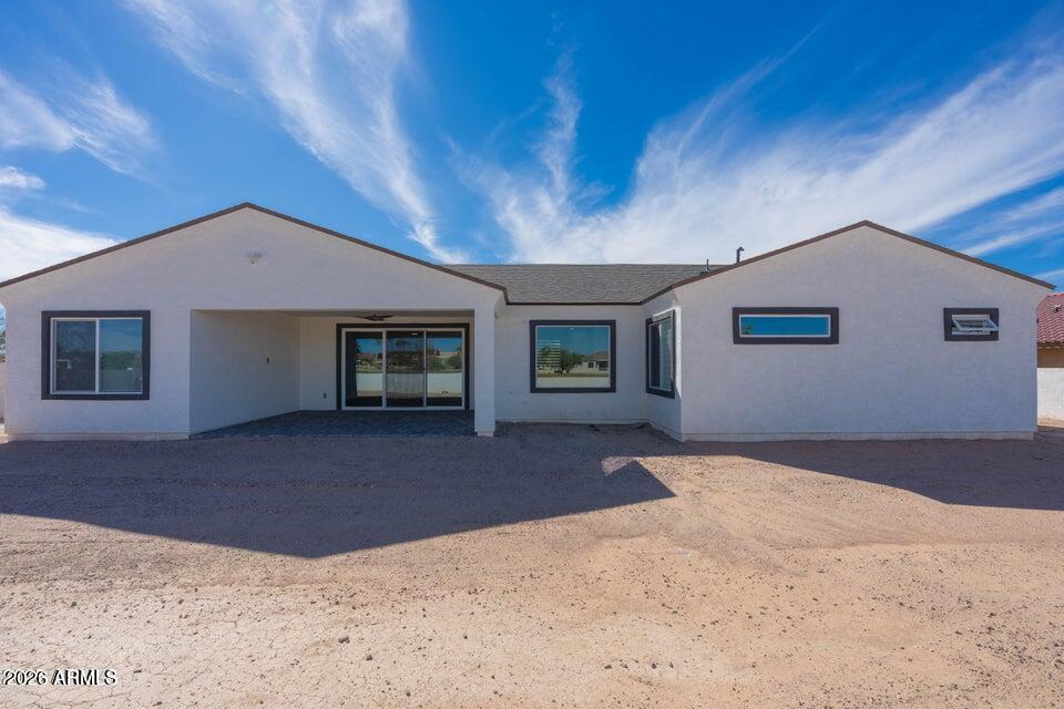 14833 South Brook Hollow Road Arizona City, AZ 85123 - Photo 50 of 61 a view of a house with a yard