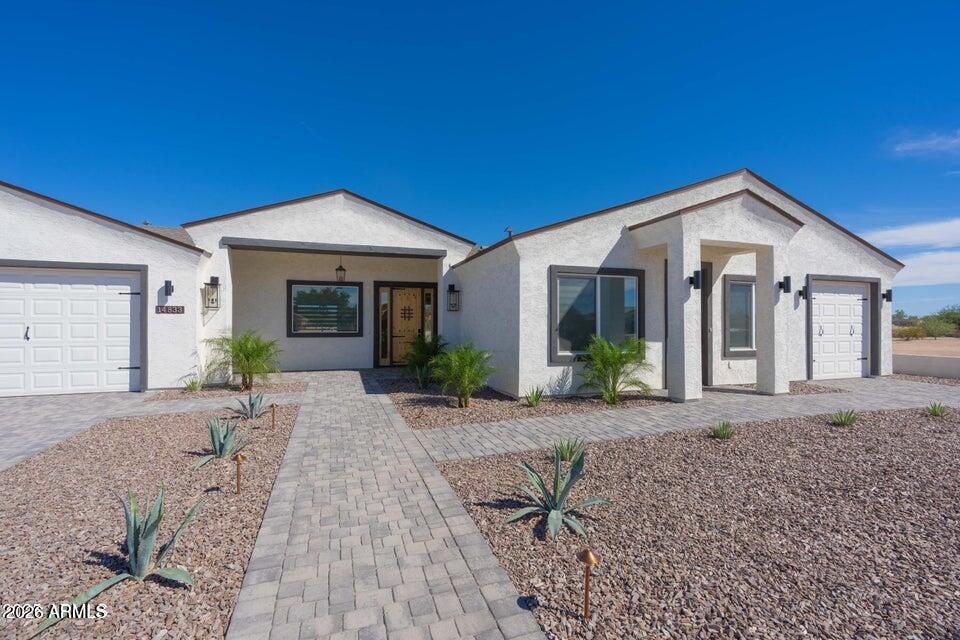 14833 South Brook Hollow Road Arizona City, AZ 85123 - Photo 5 of 61 a view of a house with a patio