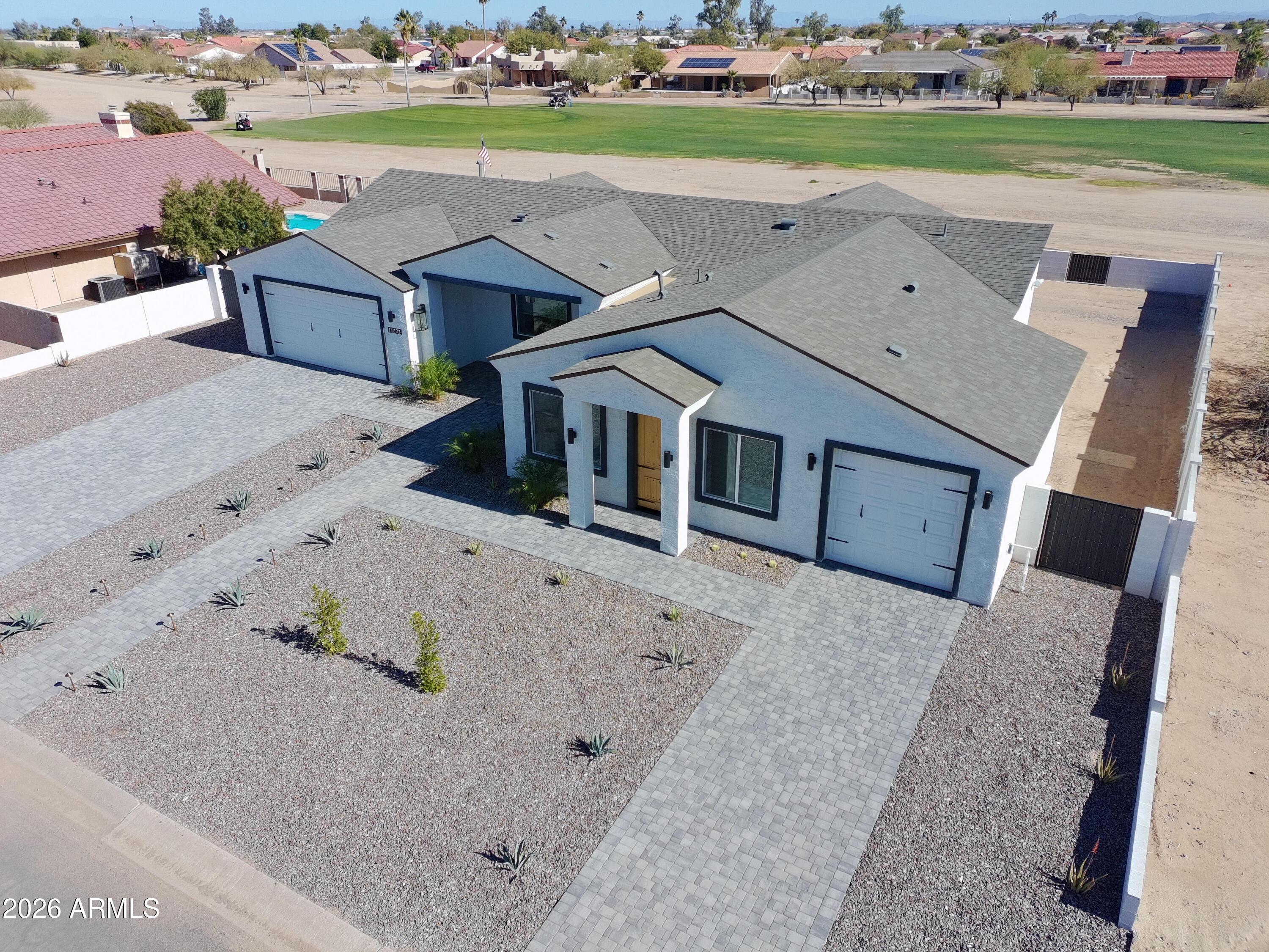 14833 South Brook Hollow Road Arizona City, AZ 85123 - Photo 59 of 61 an aerial view of a house with a yard and lake view